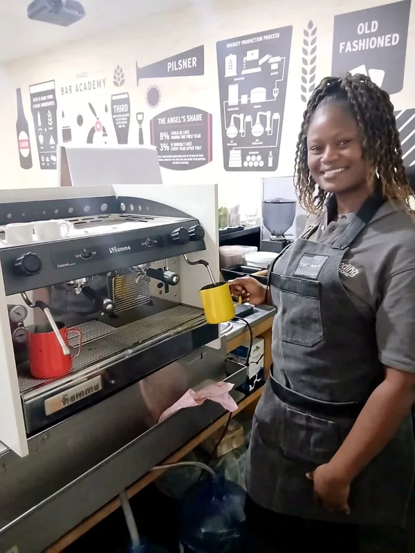 Barista training on the espresso machine