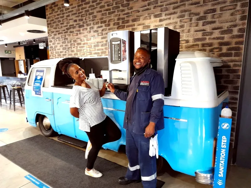 Coffee kombi bar handover, team all smiles