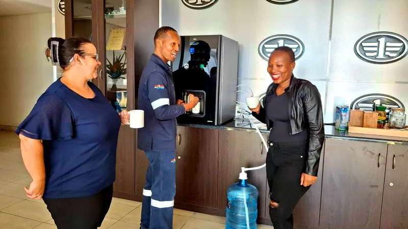 Coffee machine handover at reception