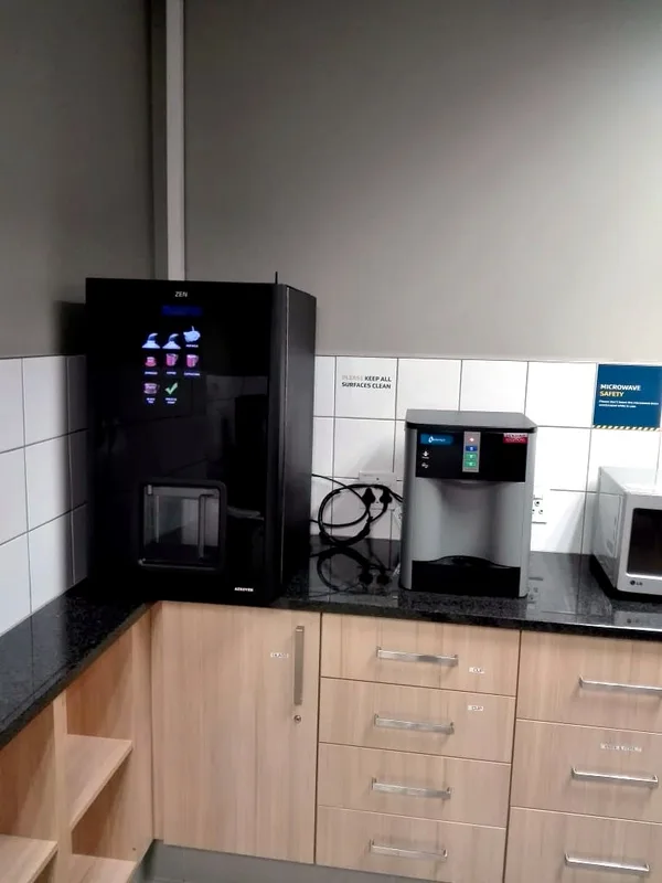 Office kitchen setup with water dispenser