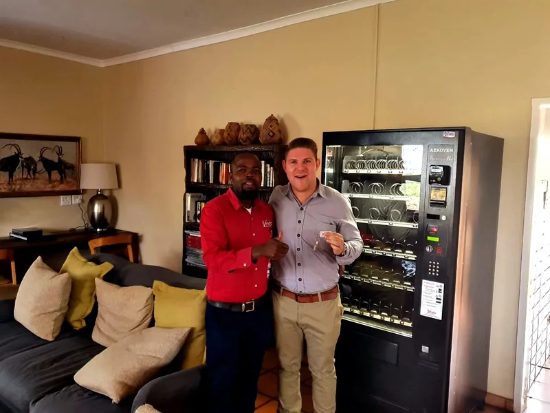 Combo machine handover at a lodge lounge