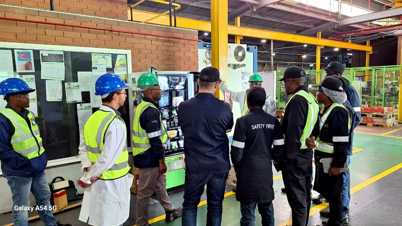 Training a factory team on their PPE dispenser