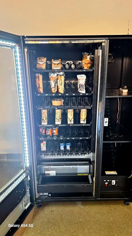 A fresh food machine open and freshly restocked