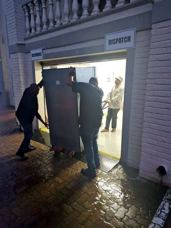 Machine delivery through the dispatch door