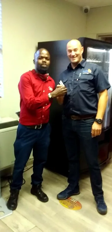 A new owner with the keys to his first machine