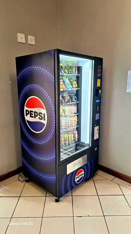 Branded snack machine in a lobby
