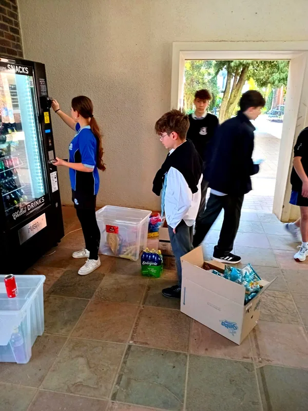 Restock day at a school snack machine