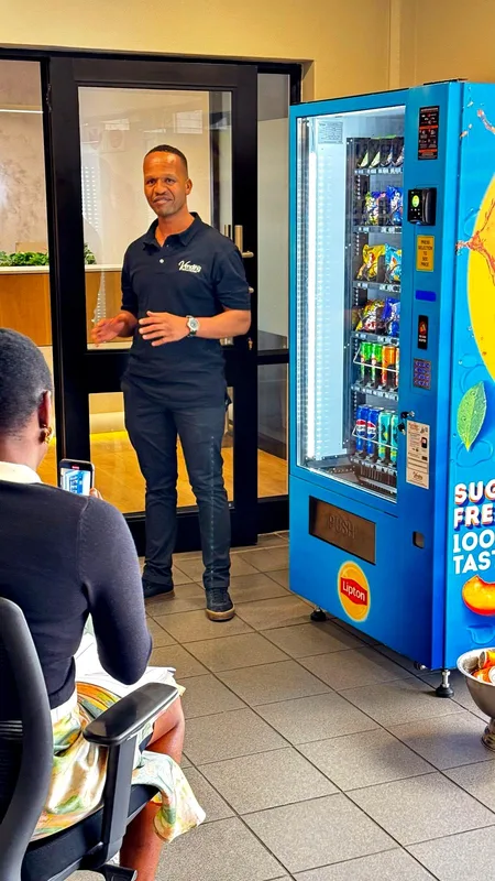 On-site training beside a branded machine