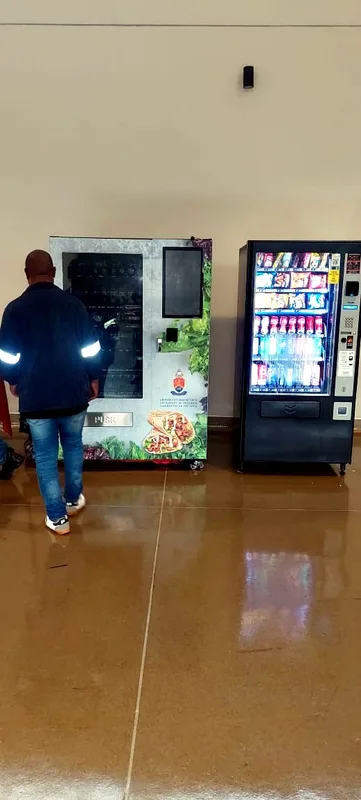 A branded fresh food machine installed alongside snacks