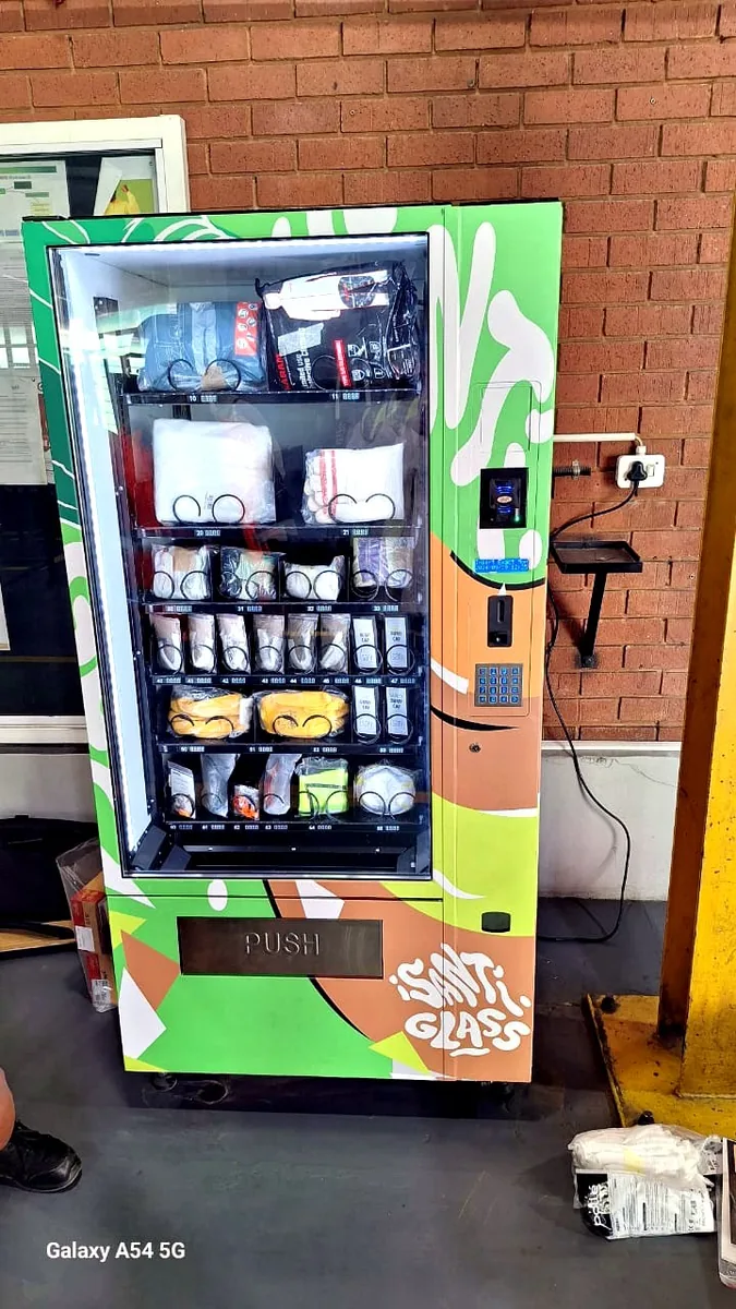 A branded PPE dispenser on site