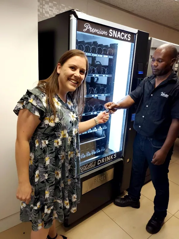 A new owner taking the keys to her machine