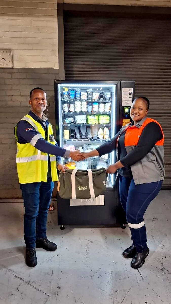 Handover day at a warehouse PPE dispenser