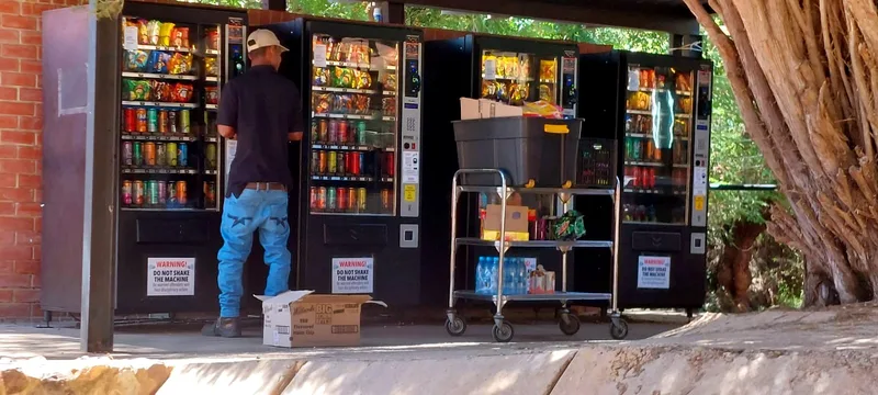 A restock run across a bank of outdoor machines