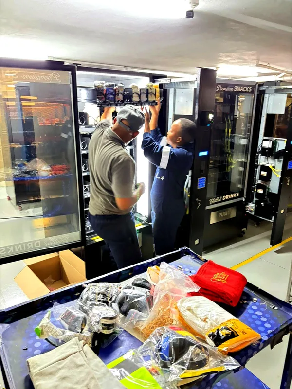 Loading gloves, masks and eyewear into the trays